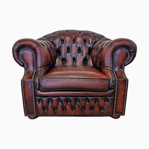 Chesterfiled Armlehnstuhl aus braunem Leder mit geschwungener Rückenlehne