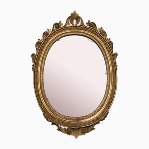 Early 19th Century Neapolitan Empire Mirror in Golden and Carved Oval-Shaped Wood