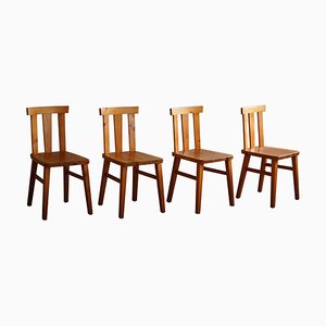 Swedish Modern Dining Chairs in Pine in the style of Axel Einar Hjorth, 1950s, Set of 4
