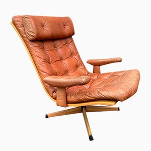 Silla giratoria Delfin Mid-Century de cuero marrón coñac de Göte Möbler Nässjö, Suecia, años 70