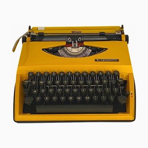 Gelbe Vintage Tippa Schreibmaschine mit lateinischen Buchstaben, 1970er