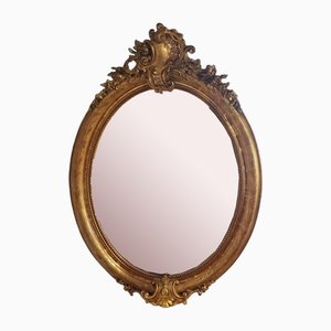 Espejo victoriano rococó con marco dorado