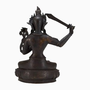 Artiste Népalais, Bodhisattva Manjushri, années 1800, Sculpture en Cuivre