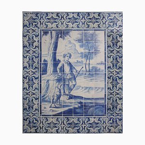 Panel de azulejos portugueses del siglo XVIII con El niño y el perro