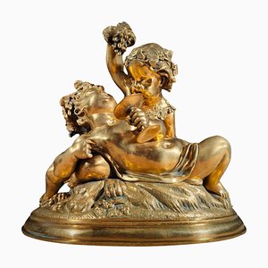 Statuetta in bronzo dorato della mietitura con due bambini, fine XIX secolo