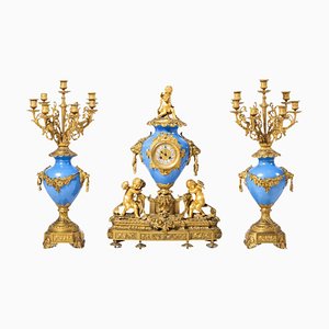 Reloj Napoleón III de porcelana Sévres, siglo XIX. Juego de 3