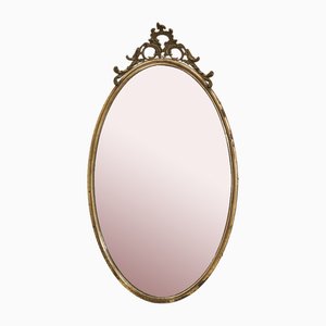 Specchio ovale con cornice lavorata, 1900