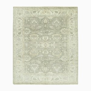 Alfombra Oushak beige decorativa de lana hecha a mano