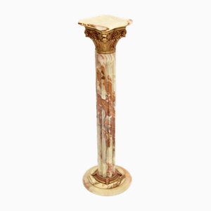 Columna corintia de ónice y metal dorado, años 30