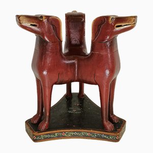 Tavolo antico in legno con teste di cane e pittura floreale