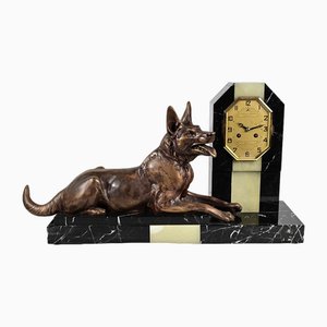 Reloj de chimenea Art Déco de mármol con figura de perro, años 30