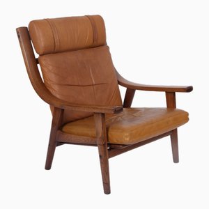 Butaca modelo GE530A de roble ahumado y cuero de Hans J. Wegner para Getama, años 70