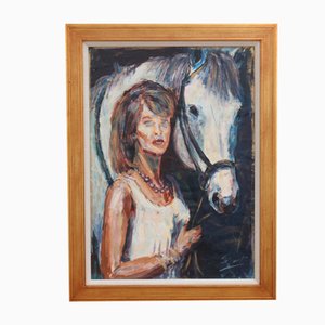 Artista de escuela francesa, Retrato de una mujer y su caballo, años 80, óleo a bordo, enmarcado