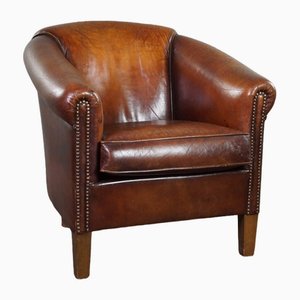 Club chair vintage in pelle di pecora