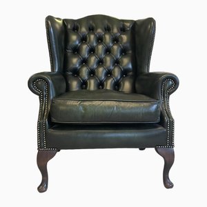 Butaca Chesterfield de cuero verde