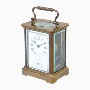 Reloj de mesa francés de latón y vidrio