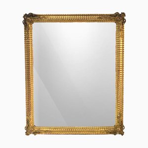 Espejo con marco dorado