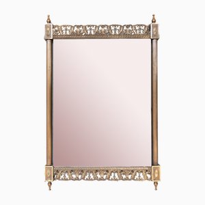 Espejo de latón con perfiles tallados, años 50