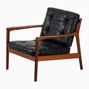 Sillón USA-75 de cuero negro atribuido a Folke Olsson para Dux, años 60