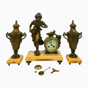 Juego de reloj Farmer de Moreau, década de 1850. Juego de 3