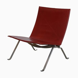 Sedia Pk-22 in pelle anilina rossa di Poul Kjærholm