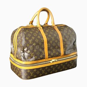 Bolso grande con compartimentos dobles de Louis Vuitton, años 70