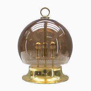 Lámpara de mesa dorada con globo de humo soplado, años 60