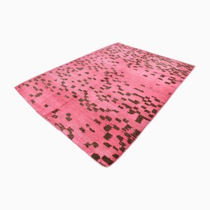 Grand tapis fait main en chanvre marron et rose vif