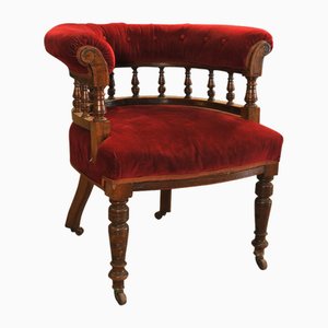 19th Century Red Velvet Leather Buttonback Captains Chair with Porcelain Castors