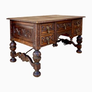 19th Century French Renaissance Hand Carved Desk or Writing Table with Carved Structure and Iron Stretcher