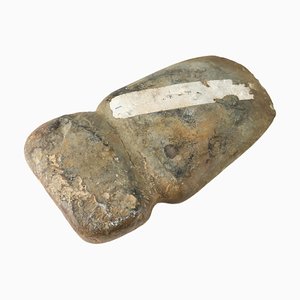 Testa di ascia in pietra scolpita indiana dei nativi americani