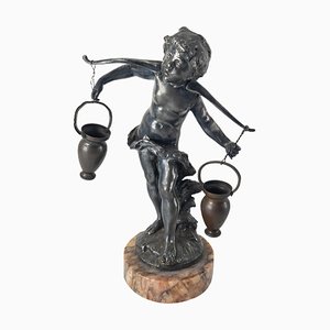 Silvered Metal Figure of Boy Carrying Water