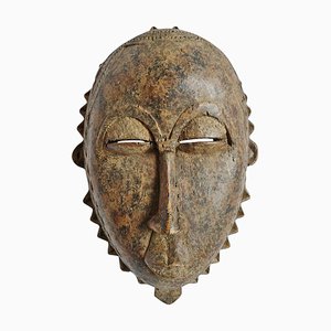 Máscara Baule vintage de madera tallada