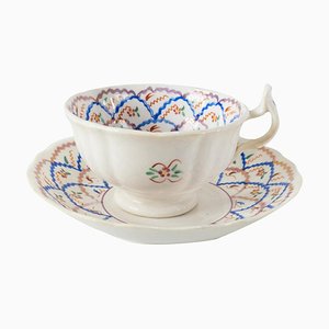 Taza de té y platillo Staffordshire ingleses, siglo XIX