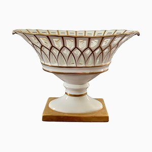 Compota de cesta reticulada de porcelana blanca reticulada y dorado