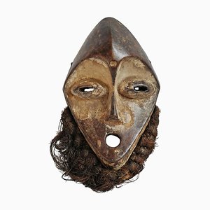 Máscara Lega vintage de madera y rafia
