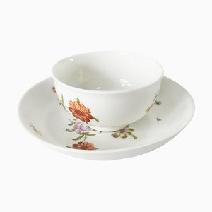 Taza de té y platillo floral de la Royal Vienna alemana, siglo XVIII