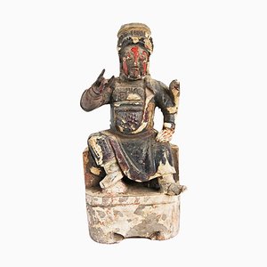 Figura dell'imperatore antica in legno intagliato