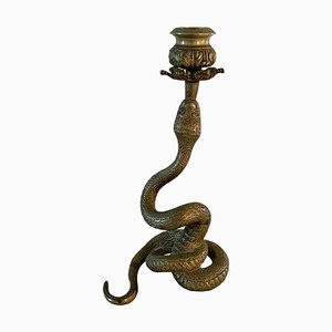 Candelabro serpiente vintage de latón