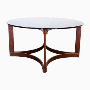 Mesa de centro de madera curvada y vidrio ahumado atribuida a Ingmar Relling, 1960