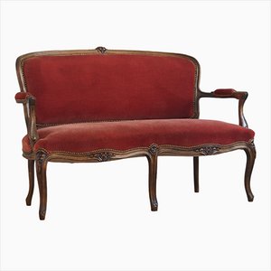 Banco de sofá vintage tapizado en rojo