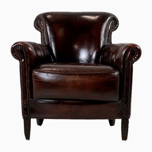 Club chair vintage in pelle di pecora