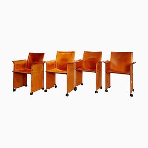 Mid-Century Armchairs on Wheels attributed to Tito Agnoli, Set of 4