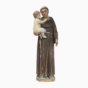 Figura de Antonio barroco con niño de madera