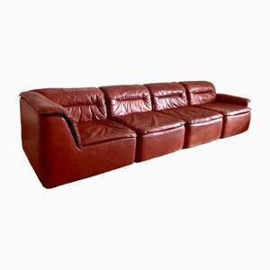 Sofá modular de cuero rojo de Friedrich Hill para Walter Knoll, años 60. Juego de 4