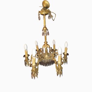 Lámpara de araña de bronce con colgantes de cristal