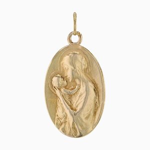 Colgante con medalla de la Virgen con el Niño de oro amarillo de 18 kt, siglo XX de Dropsy