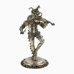 Figura in argento di Arlecchino che gioca, Germania, XIX secolo