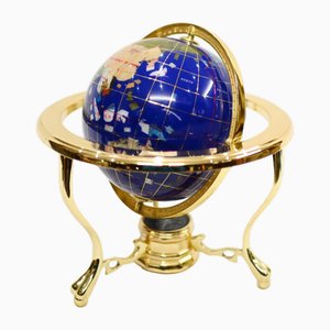 Brújula del globo del mundo de piedra de latón