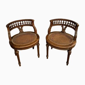 Louis XVI Style Walnut Armchairs with Cane and Spools, Late 19th Century, Set of 2